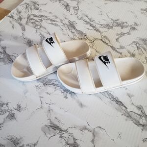 Nike White Dual-Strap Slide Sandals with Black Swoosh